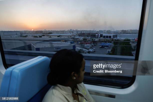 Passenger onboard a metro train in Dubai, United Arab Emirates, on Wednesday, Nov. 29, 2023. More than 70,000 politicians, diplomats, campaigners,...
