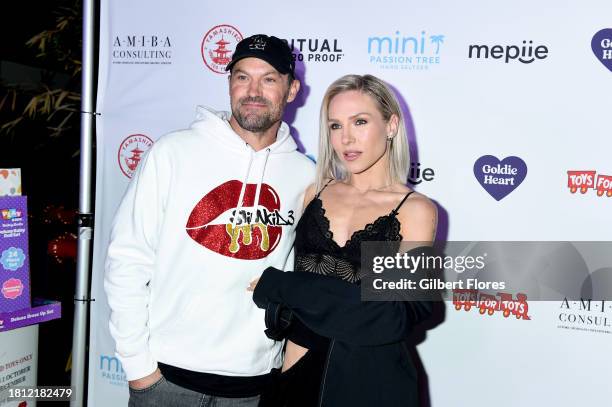 Brian Austin Green and Sharna Burgess at The 10th Annual Winter Wonderland Toys for Tots Charity Event at Yamashiro on November 29, 2023 in Los...