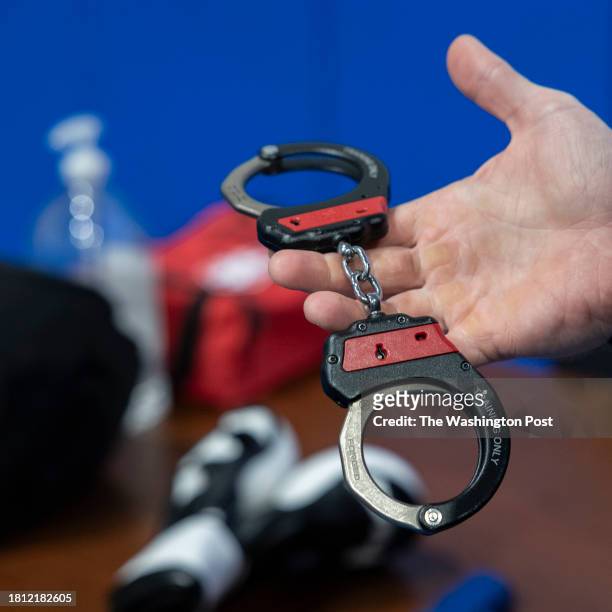 November 7: Simulation handcuffs are used in lessons on control tactics taught to federal air marshals at the TSA training center in Atlantic City,...