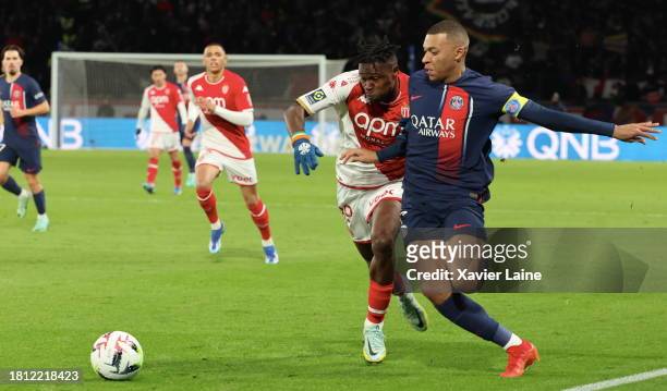 Kylian Mabppe of Paris Saint-Germain in action with Wilfried Singo of Monaco during the Ligue 1 Uber Eats match between Paris Saint-Germain and AS...