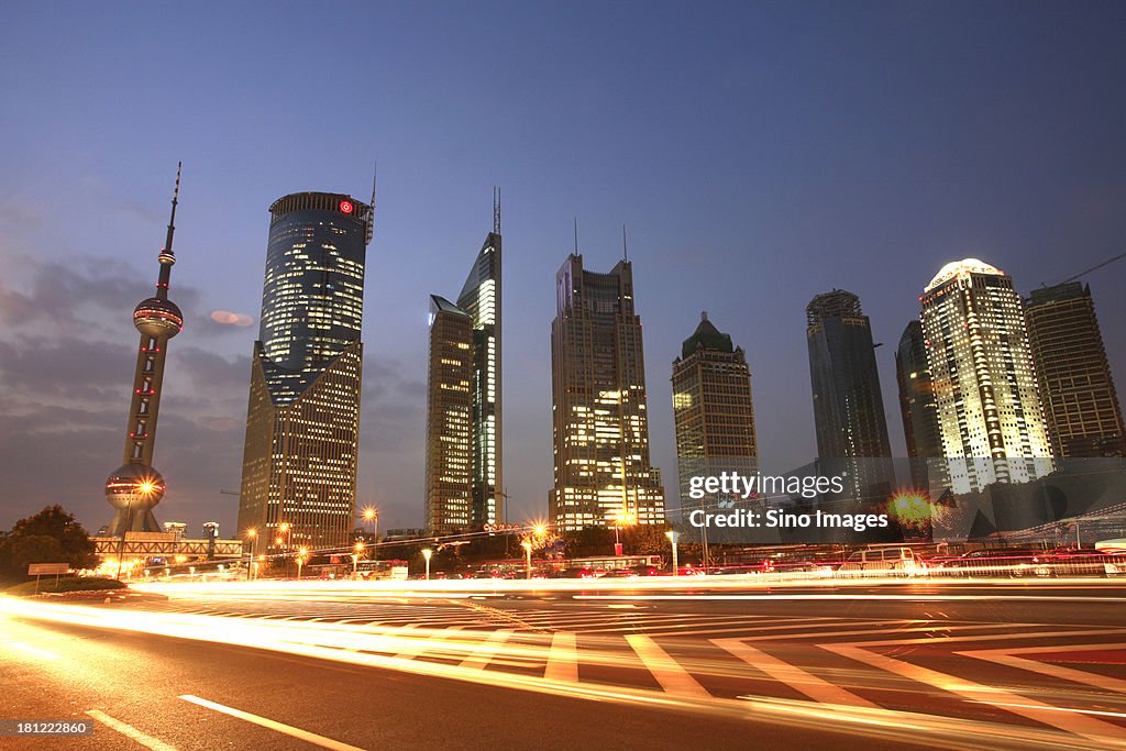 Shining Shanghai towers and highway