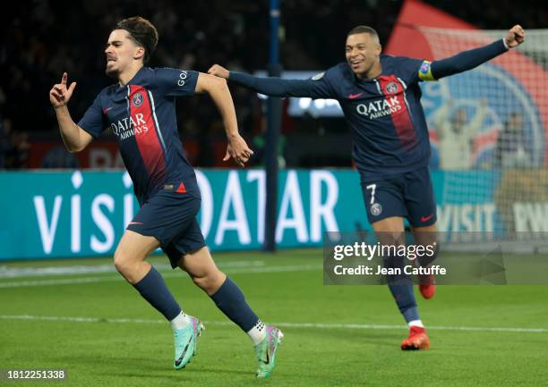 Vitinha of PSG celebrates his goal with Kylian Mbappe during the Ligue 1 Uber Eats match between Paris Saint-Germain and AS Monaco at Parc des...