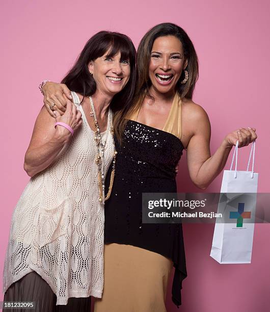 Television host Marabina Jaimes gets a gift from Sherrie Berry's Skin Again Product Line Kearney Group - "Iced Out" Luxury Emmy Suite on September...