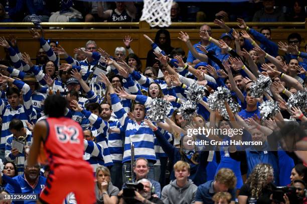 Duke Blue Devils fans attempt to distract Kiyron Powell of Southern Indiana Screaming Eagles as he shoots a free throw during the second half of the...