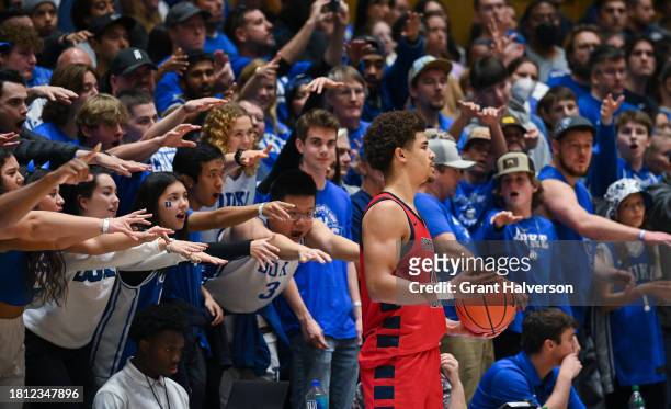 Duke Blue Devils fans taunt A.J Smith of Southern Indiana Screaming Eagles as he attempts to inbound the ball during the second half of the game at...