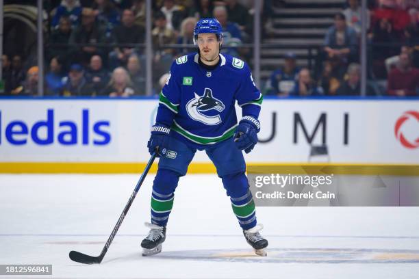 Teddy Blueger of the Vancouver Canucks skates up ice during the first period of their NHL game against the Seattle Kraken at Rogers Arena on November...