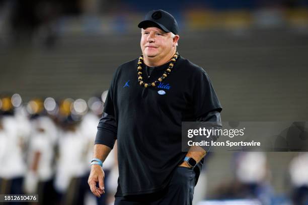 Bruins head coach Chip Kelly walks on the field during a college football game against Cal Golden Bears on November 25, 2023 at Rose Bowl Stadium in...