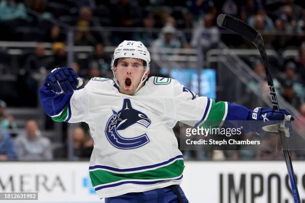 Nils Hoglander of the Vancouver Canucks celebrates his goal during the third period against the Seattle Kraken at Climate Pledge Arena on November...
