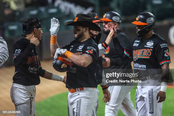 Agustin Murillo of Naranjeros celebrates a home run in the fourth inning during a game between Naranjeros de Hermosillo and Aguilas de Mexicali as...
