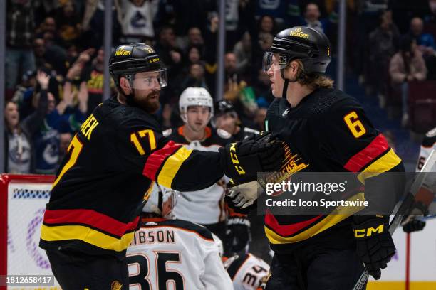 Vancouver Canucks defenseman Filip Hronek and right wing Brock Boeser celebrate after Boeser's goal during Vancouver Canucks game versus the Anaheim...