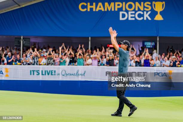 Min Woo Lee of Australia celebrates after sinking his putt on the 17th green during day three of the 2023 Australian PGA Championship at Royal...