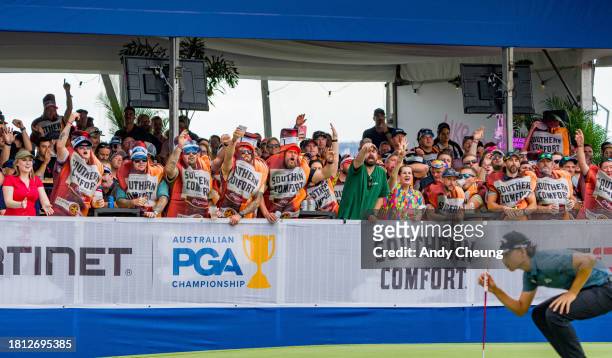 Crowds react while Min Woo Lee of Australia lines up his putt on the 17th green during day three of the 2023 Australian PGA Championship at Royal...