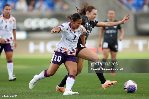 Rasamee Phonsongkham of Perth competes with Mackenzie Barry of Wellington during the A-League Women round six match between Wellington Phoenix and...