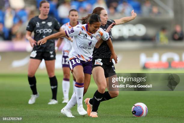 Rasamee Phonsongkham of Perth competes with Mackenzie Barry of Wellington during the A-League Women round six match between Wellington Phoenix and...