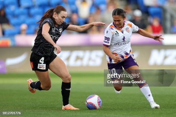 Rasamee Phonsongkham of Perth competes with Mackenzie Barry of Wellington during the A-League Women round six match between Wellington Phoenix and...