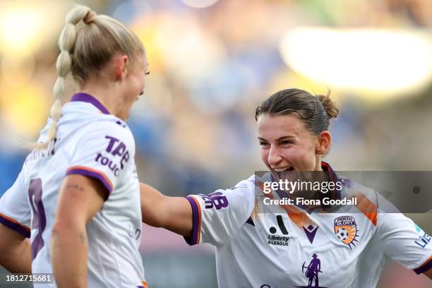 Millie Farrow of Perth celebrates a goal with Sofia Sakalis of Perth during the A-League Women round six match between Wellington Phoenix and Perth...