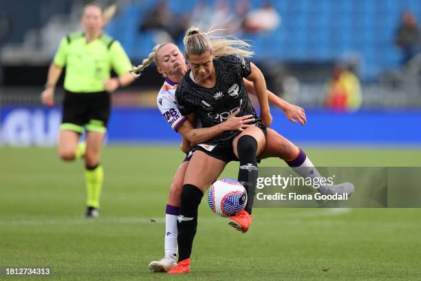 Hailey Davidson of Wellington competes with Millie Farrow of Perth during the A-League Women round six match between Wellington Phoenix and Perth...