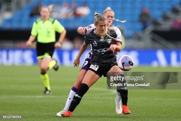 Hailey Davidson of Wellington competes with Millie Farrow of Perth during the A-League Women round six match between Wellington Phoenix and Perth...