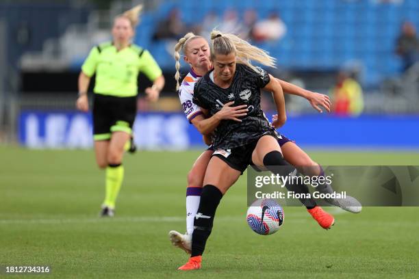 Hailey Davidson of Wellington competes with Millie Farrow of Perth during the A-League Women round six match between Wellington Phoenix and Perth...