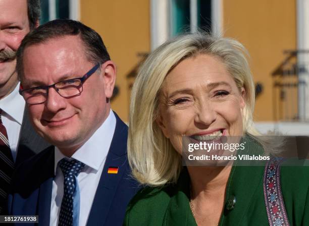 Tino Chrupalla , leader of Alternative for Germany , and French Rassemblement National representative Marine Le Pen , arrive to hold a joint press...