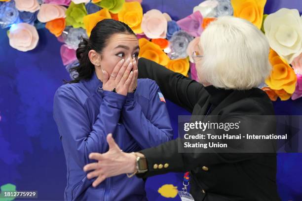 Ava Marie Ziegler of the United States reacts to her score at the kiss and cry in the Women's Free Skating during the ISU Grand Prix of Figure...