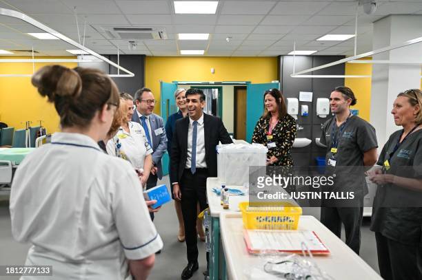 Britain's Prime Minister Rishi Sunak meets with teachers and trainee nurses during a visit of a medical training centre at the University of Surrey...