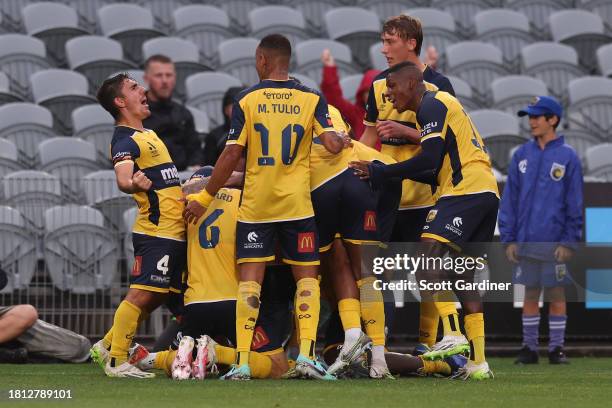 William Wilson of the celebrates a goal with team mates during the A-League Men round five match between Newcastle Jets and Central Coast Mariners at...