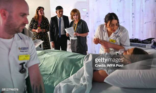 Prime Minister Rishi Sunak attends a medical demonstration, during which the mock patient is a student, during a visit to a medical training centre...