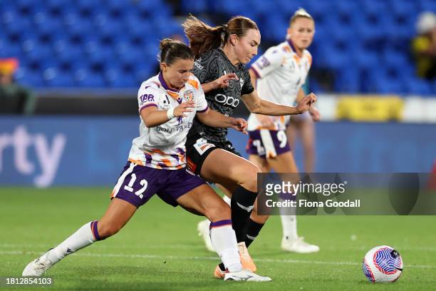 Sofia Sakalis of Perth with Mackenzie Barry of Wellington during the A-League Women round six match between Wellington Phoenix and Perth Glory at Go...