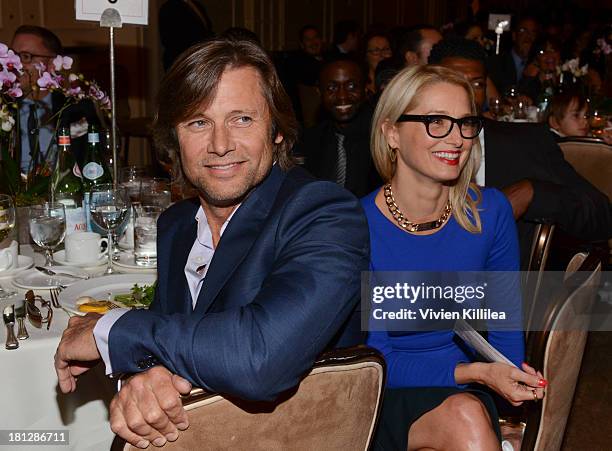 Actors Grant Show and Katherine LaNasa attend the 12th Annual Heller Awards at The Beverly Hilton Hotel on September 19, 2013 in Beverly Hills,...