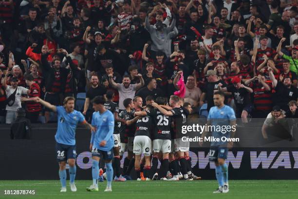 Western Sydney Wanderers players celebrate after a goal before it is disallowed by VAR during the A-League Men round five match between Sydney FC and...