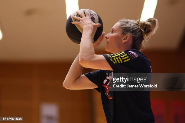Sami Whitcomb of the Fire warms up before the WNBL match between Perth Lynx and Townsville Fire at Bendat Basketball Stadium, on November 25 in...