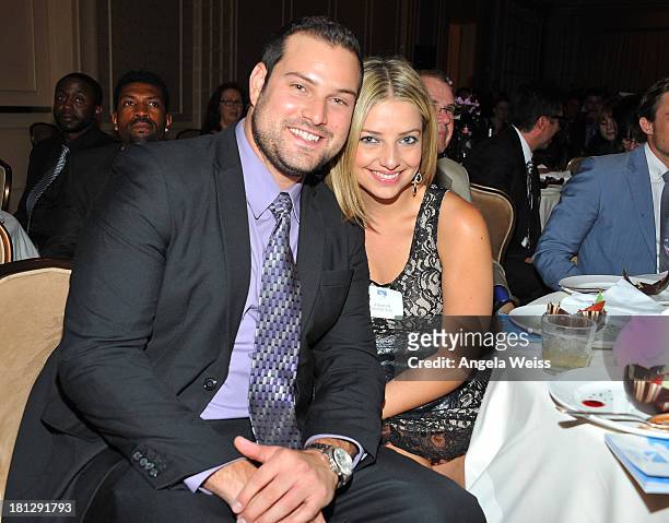 Actress Max Adler and Jennifer Bronstein attend the 12th Annual Heller Awards at The Beverly Hilton Hotel on September 19, 2013 in Beverly Hills,...
