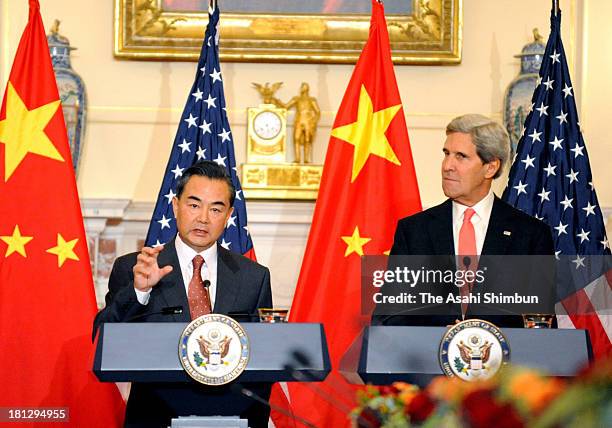Secretary of State John Kerry and Chinese Foreign Minister Wang Yi deliver opening statements prior to the start of bilateral meetings at the State...