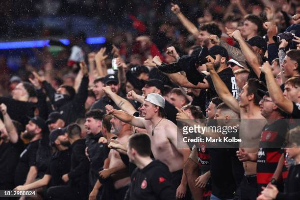 Wanderers supporters celebrate a goal during the A-League Men round five match between Sydney FC and Western Sydney Wanderers at Allianz Stadium, on...
