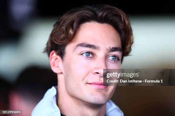 George Russell of Great Britain and Mercedes looks on in the garage during final practice ahead of the F1 Grand Prix of Abu Dhabi at Yas Marina...