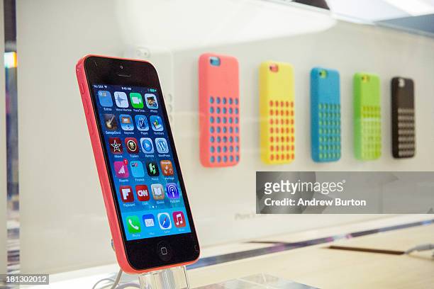 The iPhone 5C is seen on display at the Fifth Avenue Apple store on September 20, 2013 in New York City. Apple launched two new models of iPhone: the...
