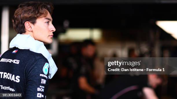 George Russell of Great Britain and Mercedes looks on in the garage during final practice ahead of the F1 Grand Prix of Abu Dhabi at Yas Marina...