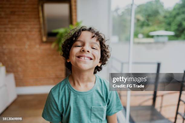 portrait of a boy at home - generation alpha stock pictures, royalty-free photos & images