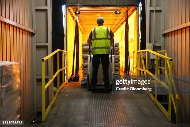 Worker loads a pallet of packed rice goods onto a truck at a warehouse at the Veetee Rice Ltd. Facility in Rochester, UK, on Wednesday, Aug. 9, 2023....