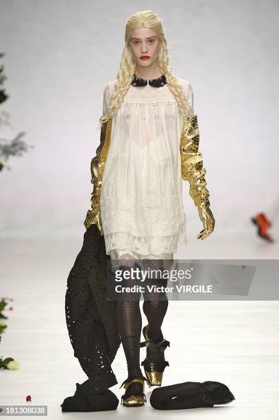 Model walks the runway at the Meadham Kirchhoff show during London Fashion Week SS14 at TopShop Show Space on September 17, 2013 in London, England.