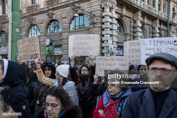 Activists hold placards as they take part in the demonstration "Il Patriarcato Uccide" , demanding the elimination of violence against women on...