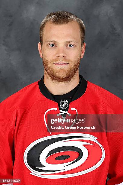 Tim Gleason of the Carolina Hurricanes poses for his official NHL headshot at Carolina Family Practice and Sports Medicine on September 11, 2013 in...