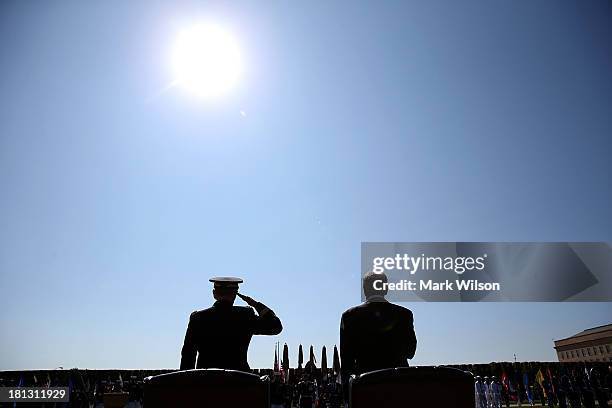 Secretary of Defense Chuck Hagel and Chairman of the Joint Chiefs of Staff Gen. Martin E. Dempsey participate in a ceremony to honor POW and MIA's at...