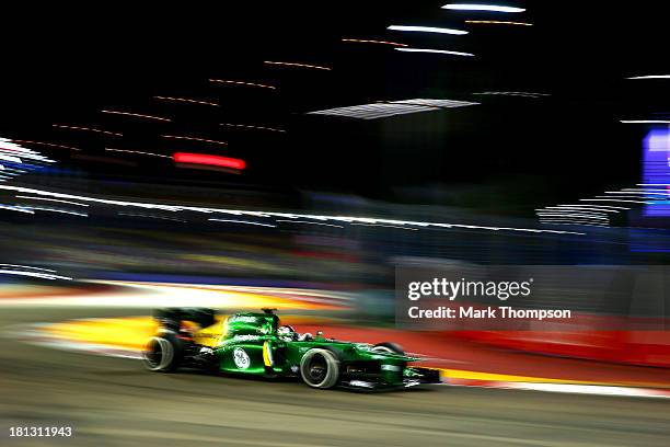 Giedo van der Garde of the Netherlands and Caterham drives during practice for the Singapore Formula One Grand Prix at Marina Bay Street Circuit on...