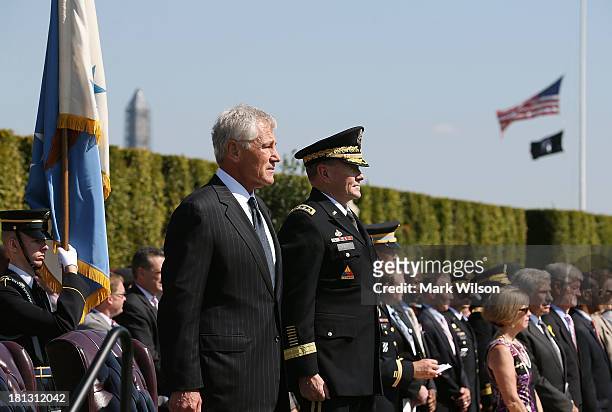 Secretary of Defense Chuck Hagel and Chairman of the Joint Chiefs of Staff Gen. Martin E. Dempsey participate in a ceremony to honor POW and MIA's at...