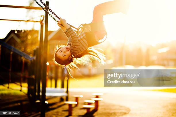 swing me higher - innocence stock pictures, royalty-free photos & images