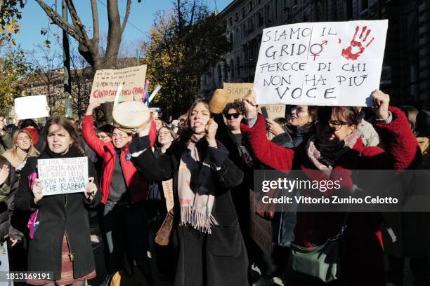 Activists take part in the demonstration "Il Patriarcato Uccide" , demanding the elimination of violence against women on November 25, 2023 in Milan,...