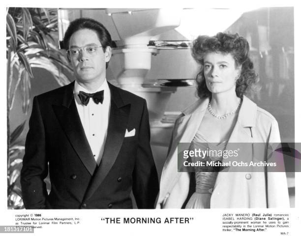 Actor Raul Julia and actress Diane Salinger on set of the movie " The Morning After in 1986.