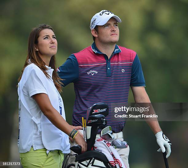 Ladies European Tour player Matia Mafiuletti of Italy caddies for Gary Boyd plays a shot during the second round of the Italian Open golf at Circolo...